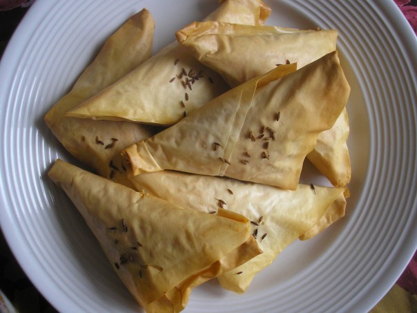Meat and pine nut pastries